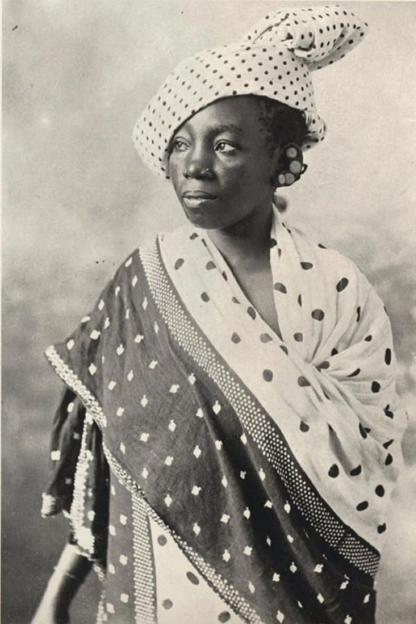 19th century, Zanzibari woman wearing kanga with pride