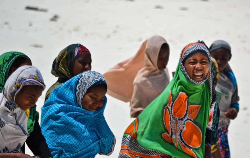 Zanzibari women wearing kangas with pride