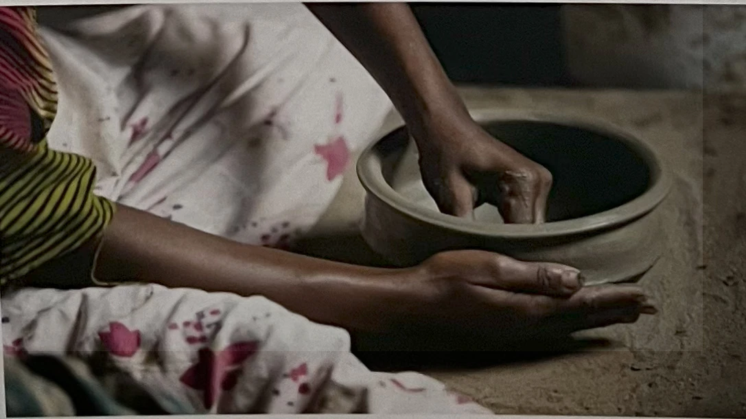 Zanzibari women working on traditional pottery